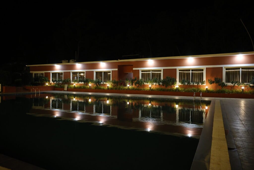 Ashoka Jungle River Resort entrance and landscaped surroundings in Dandeli