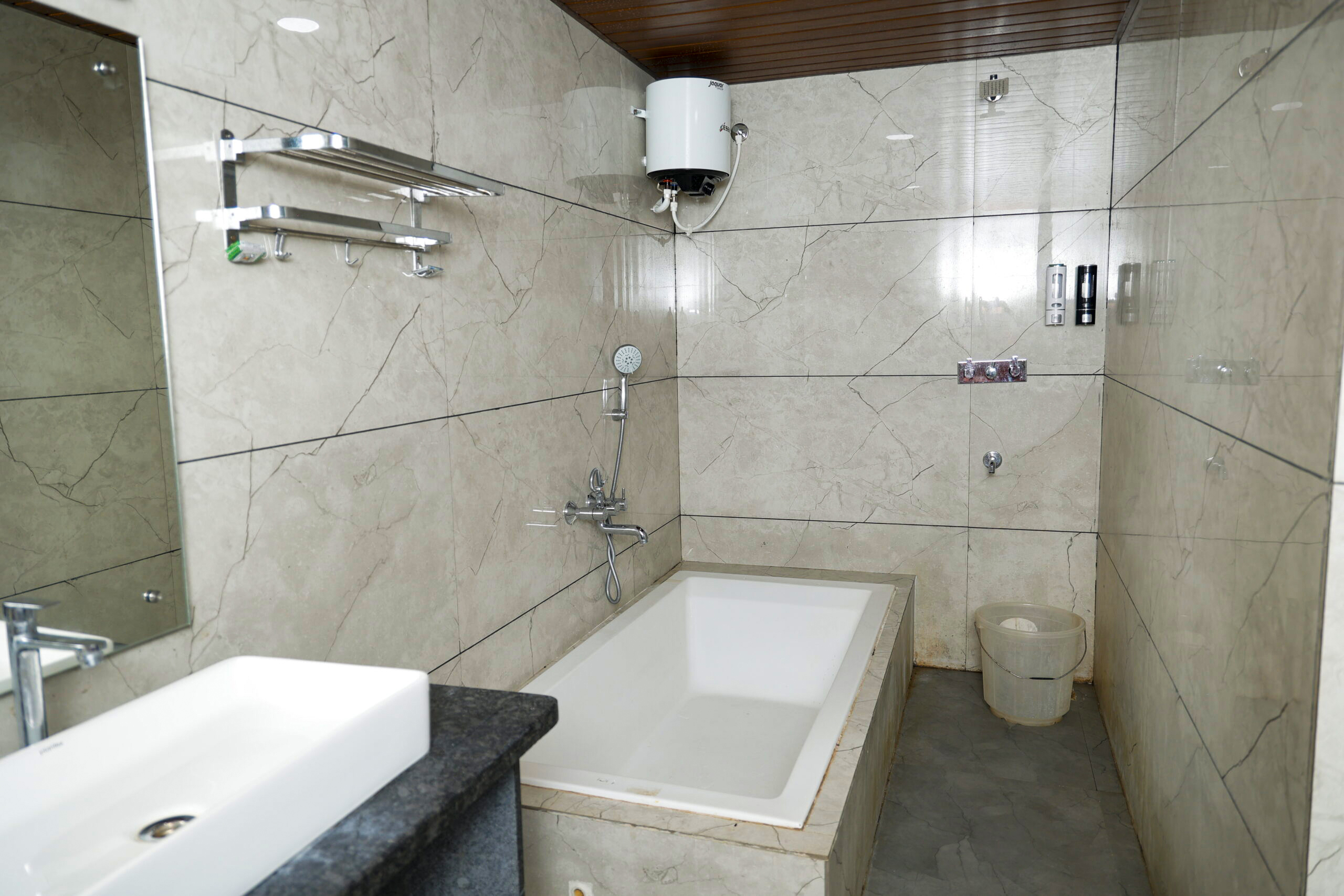 Attached bathroom facility in AC Executive Room at Dandeli resort